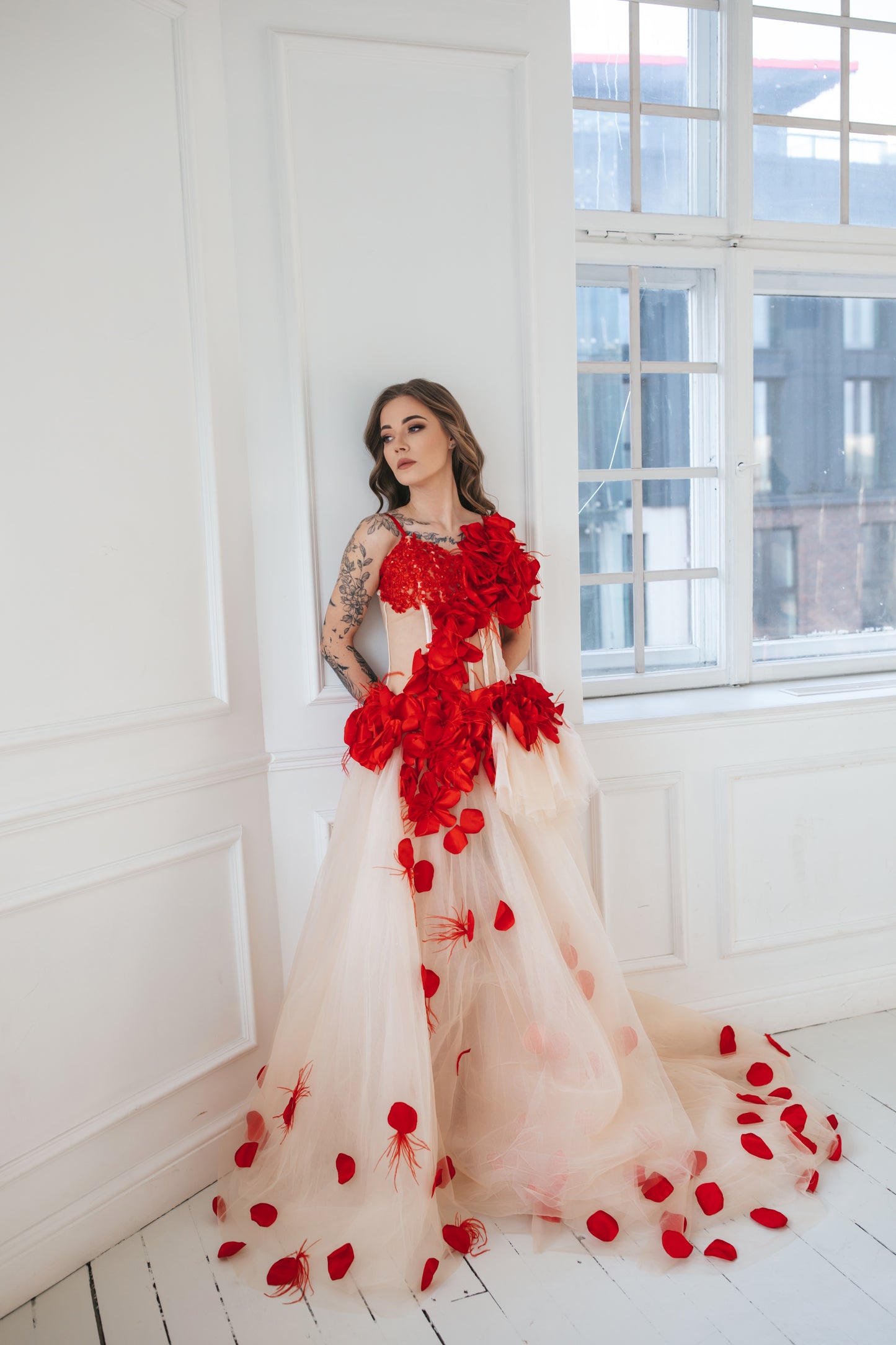 Red Gown With Feathers And Roses