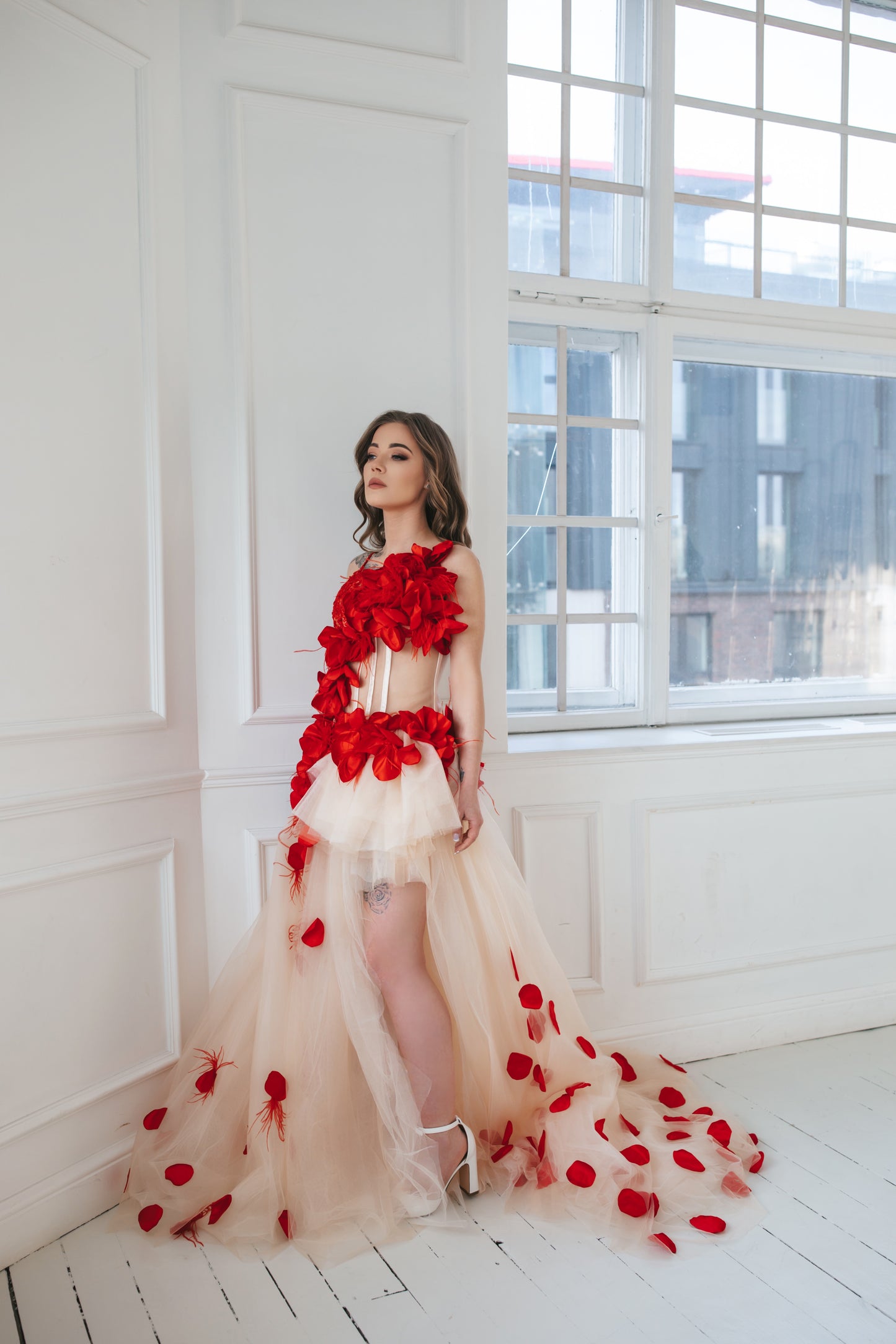 Red Gown With Feathers And Roses