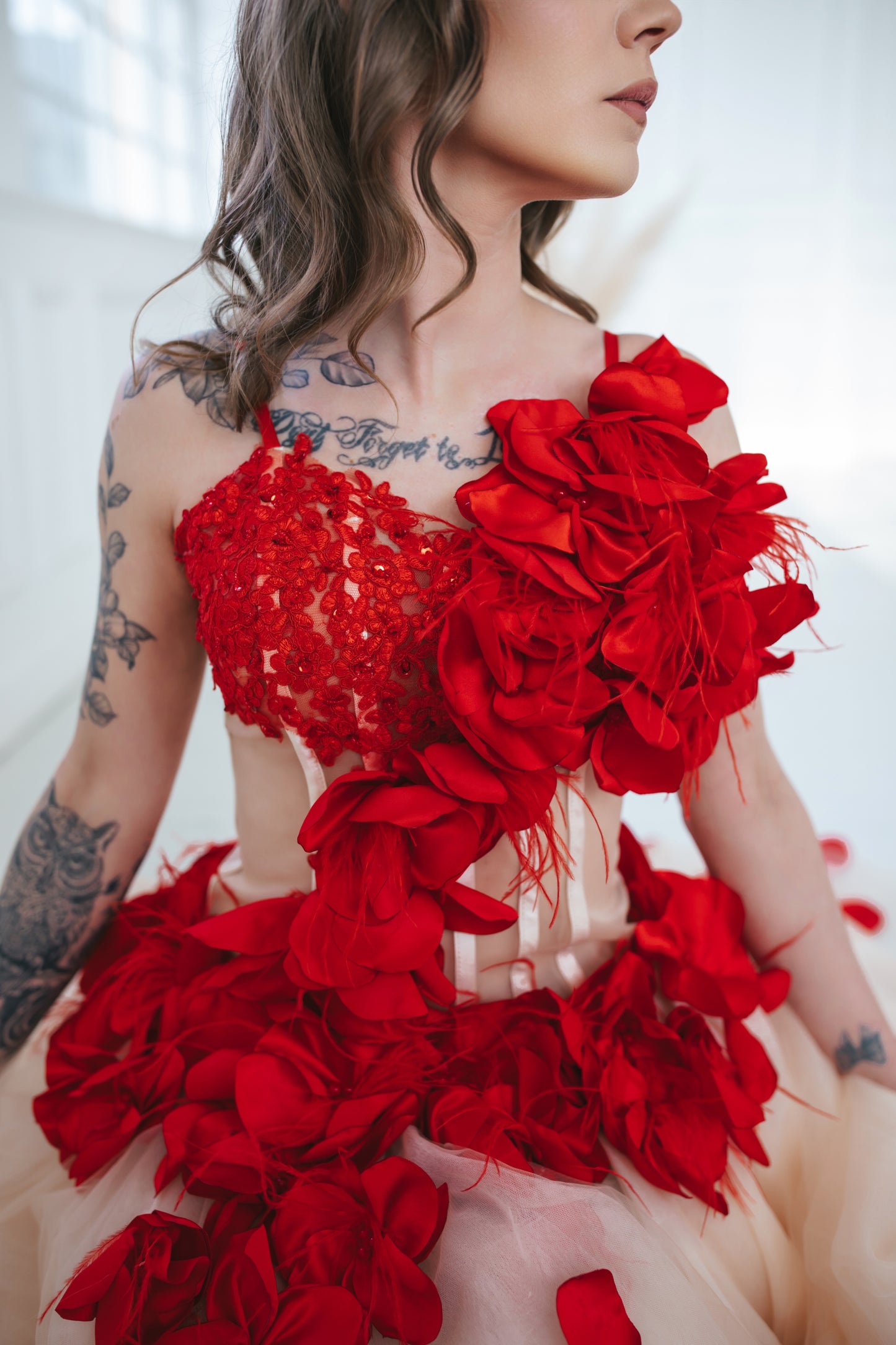 Red Gown With Feathers And Roses